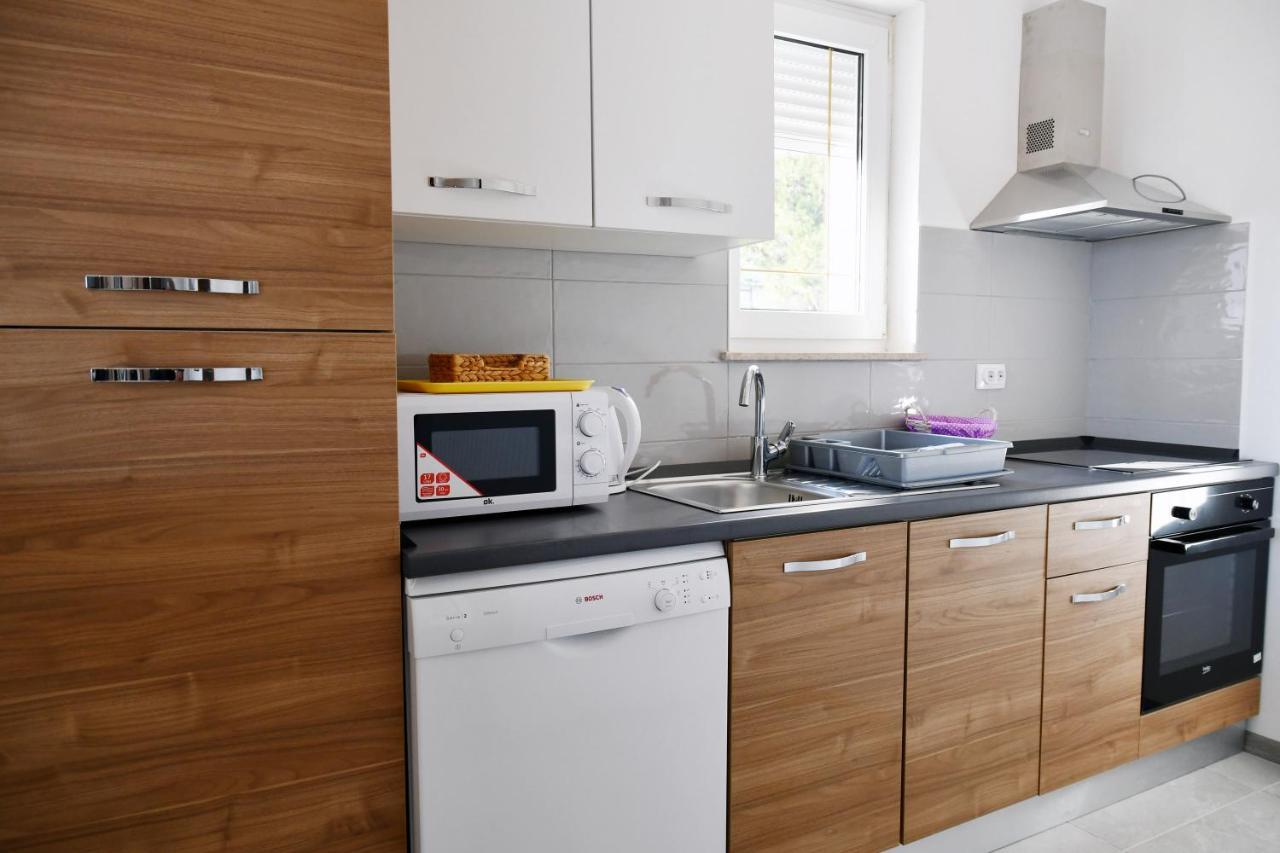 Apartments Novotny Banjol Bagian luar foto